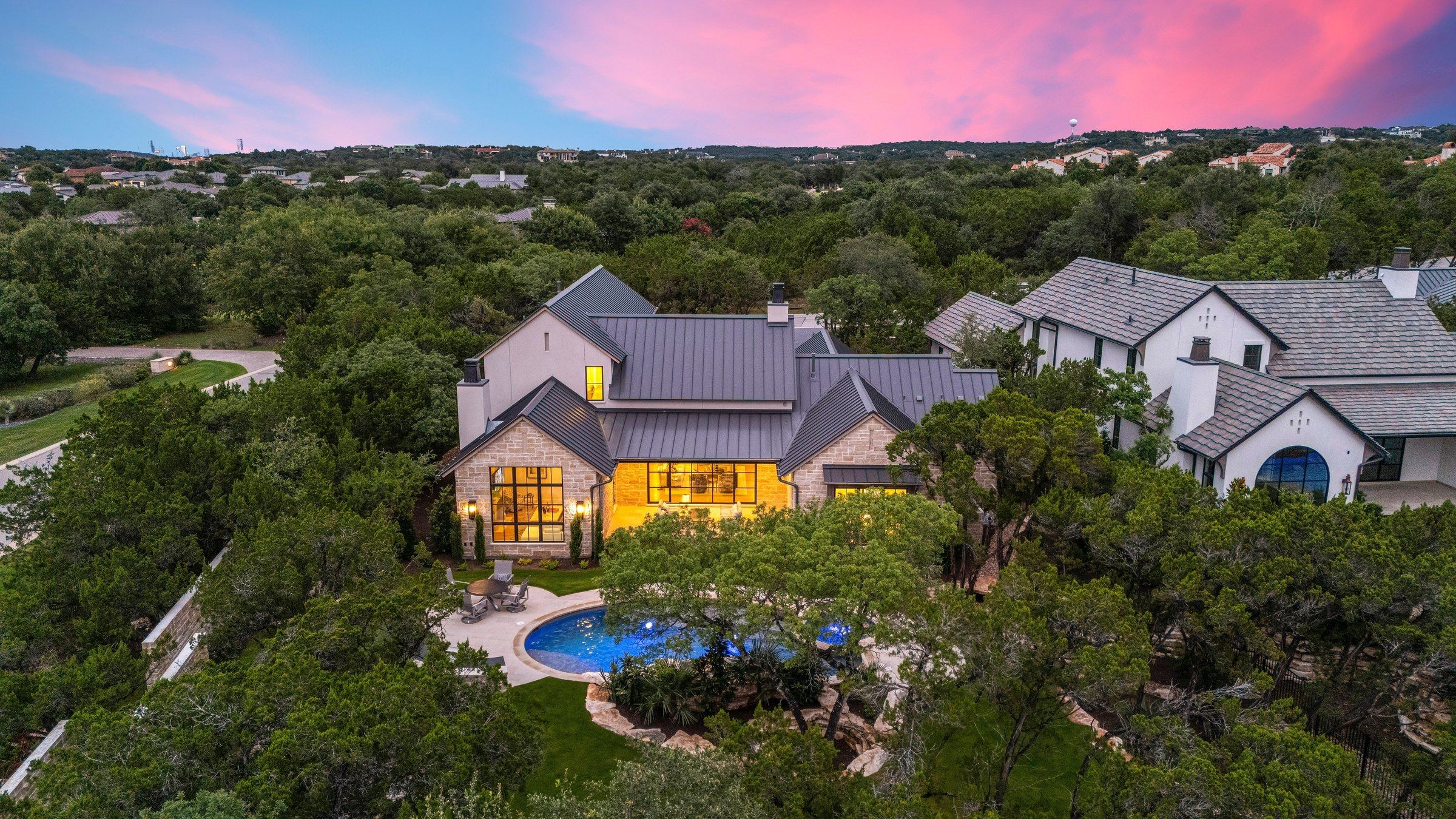 Twilight aerial view of 4300 Amarra and the protected greenbelt